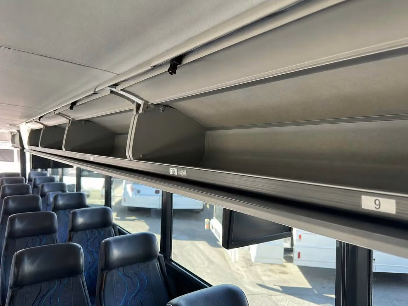 bell 18 passenger minibus overhead storage