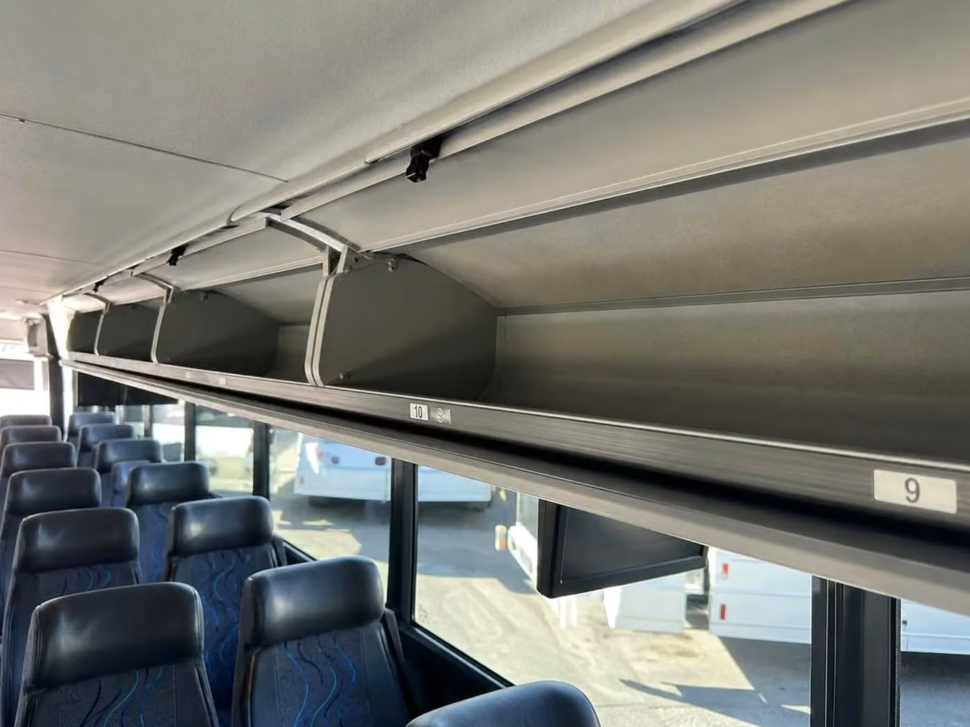 bell 28 passenger minibus overhead storage