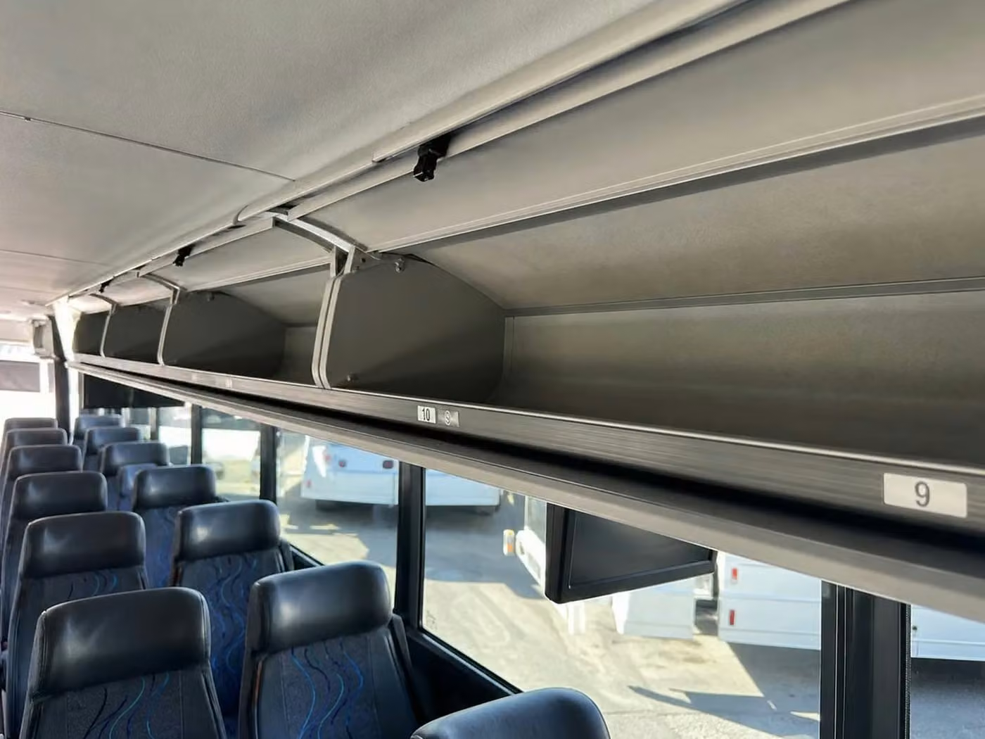 bell 35 passenger minibus overhead storage