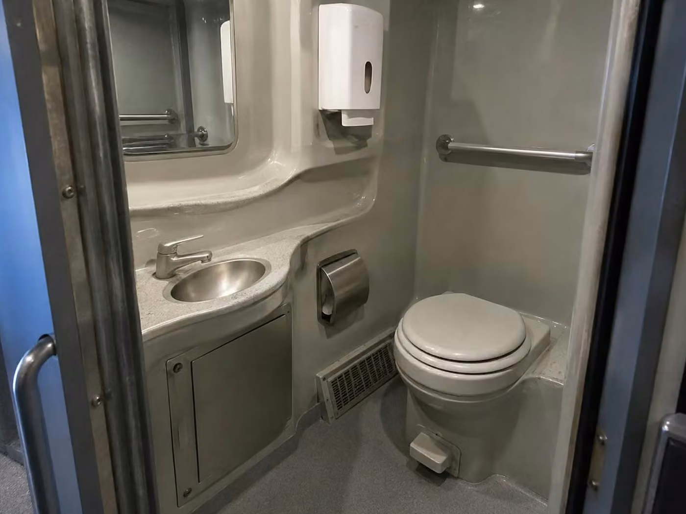 bell 56 passenger charter bus onboard restroom
