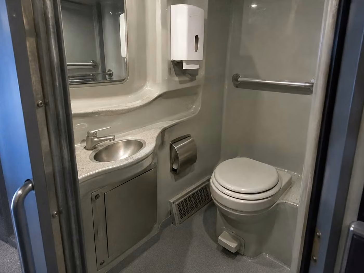 bell charter bus onboard restroom