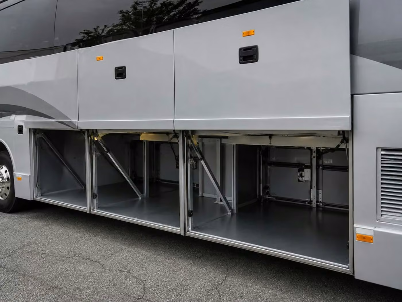 bell charter bus under bus storage