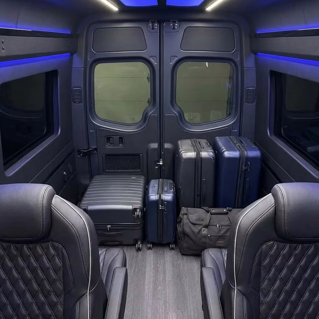 bell sprinter van rental with driver luggage area